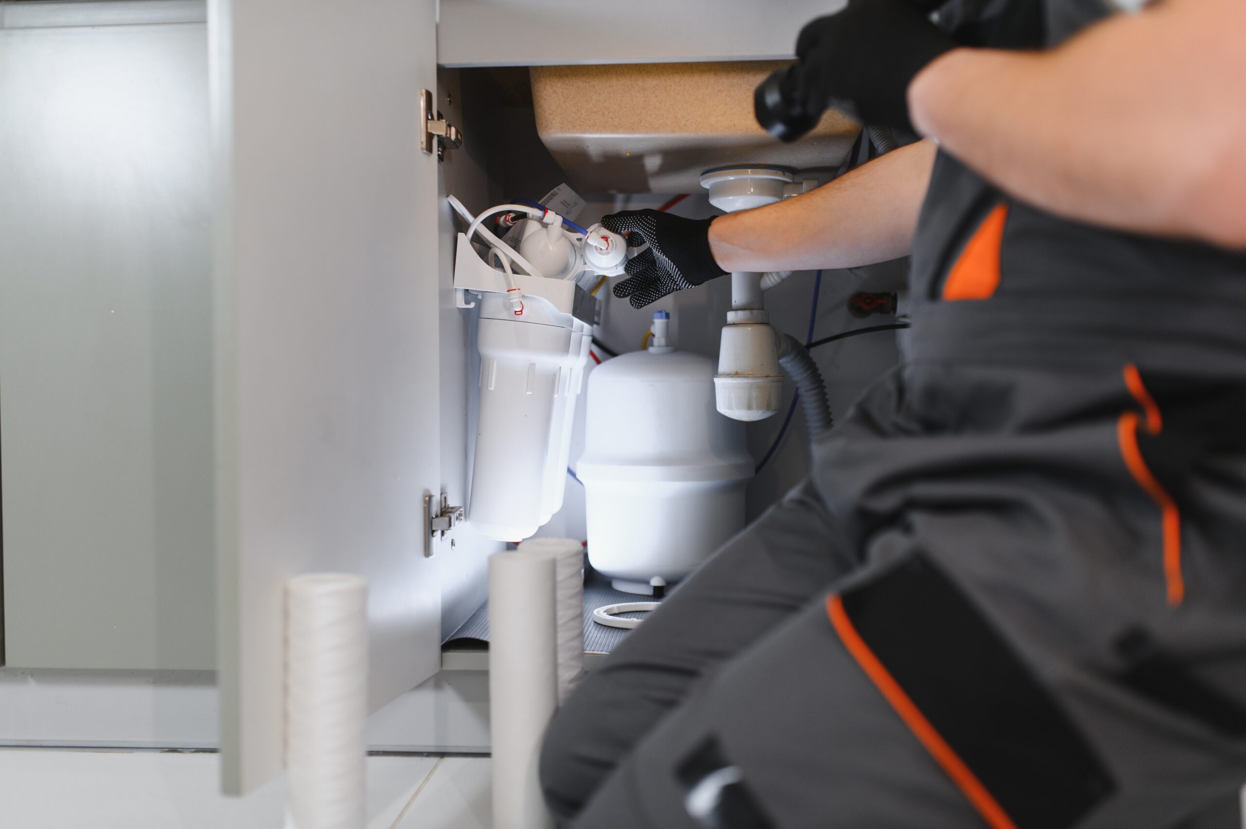 Plumber selecting durable water pipe installation materials for long-lasting plumbing system